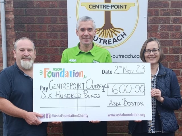 Asda's Stephen Bromby with Centrepoint Outreach staff.