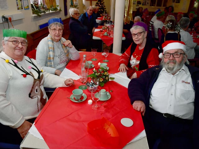 Ready for a cuppa after enjoying a delicious meal at Wainfleet Methodist Church are (from left) Sherry Cardin, Anne Goodger, Cynthia Pieniak and Joe Wilkinson