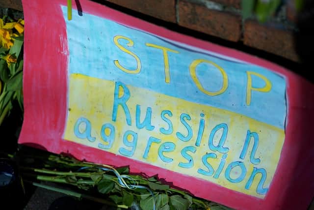 Flowers and messages of support left outside the Ukraine Embassy in Dublin. Tanaiste Leo Varadkar said ministers will look at how Ireland can help the people of Ukraine, both in its political and humanitarian response. Picture date: Thursday March 3, 2022.
