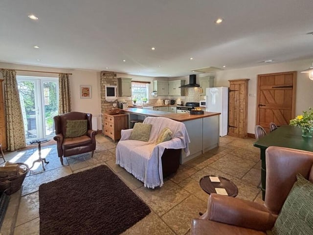 The open-plan kitchen, living and dining area.