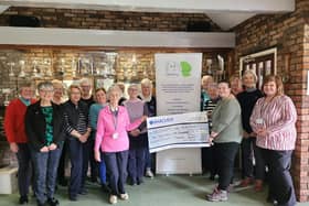 Pictured holding the cheque are Val, from Boston Golf Club (left) and Ann-Marie, from Headway Lincolnshire.