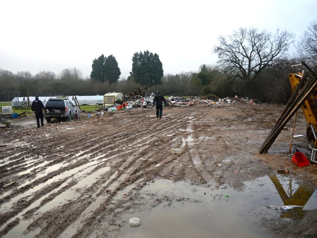 Police and council officers searched the site at Ancaster. Photo: SKDC