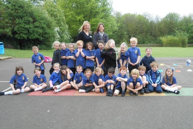 Caistor Primary School celebrating its 'good' rating from education watchdog Ofsted. Pictured with the Willow class is headteacher Zoe Hyams (left) and assistant headteacher Anna Shepherd.