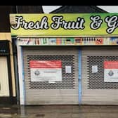 Posters from Lincolnshire Police have been placed on the shutters of the Fresh Fruit and Grocery store in Sleaford. Photo: Lincs Police