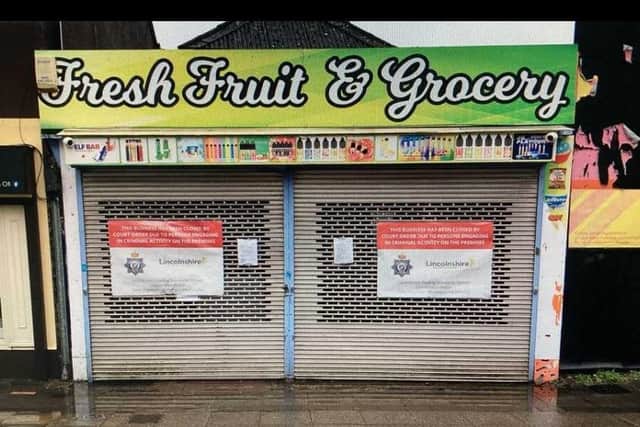 Posters from Lincolnshire Police have been placed on the shutters of the Fresh Fruit and Grocery store in Sleaford. Photo: Lincs Police