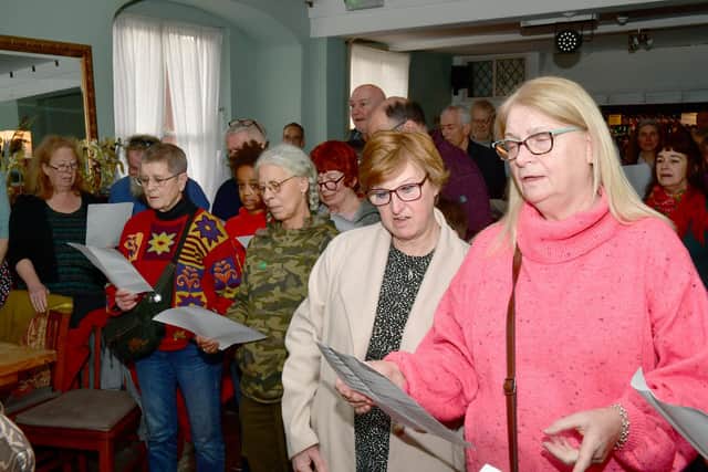 Campaigners learning a song 'A Message to you, Rishi'.