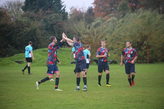 Broughton celebrate against Sleaford United