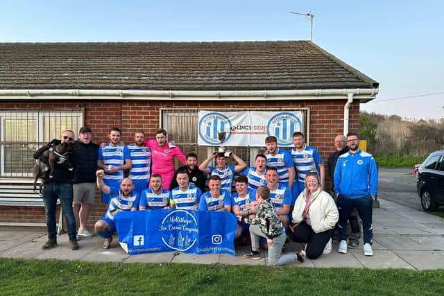 Sutton FC's team posing at Furlongs Field.