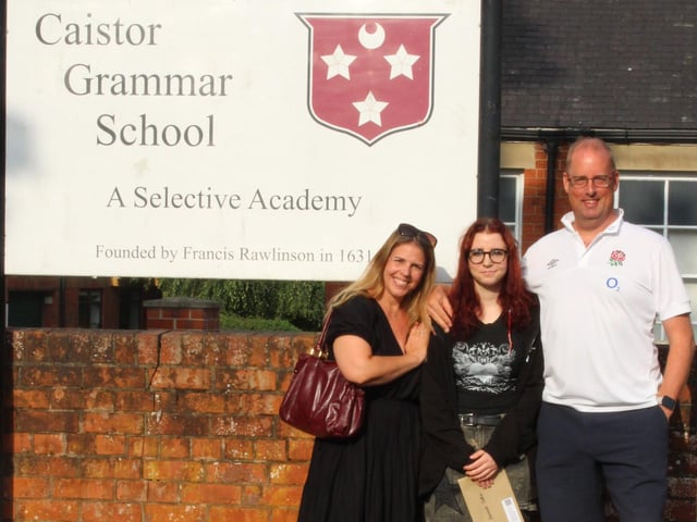 Proud parents with their daughter on A Level results day at Caistor Grammar School.