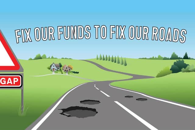 £12 million has been cut from the roads maintenance budget