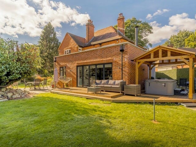 The rear of the home, with an area of decking.