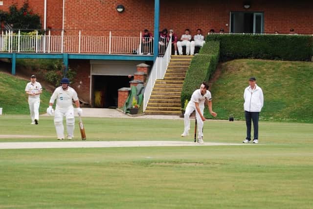 Barend Lourens bowling for Louth.