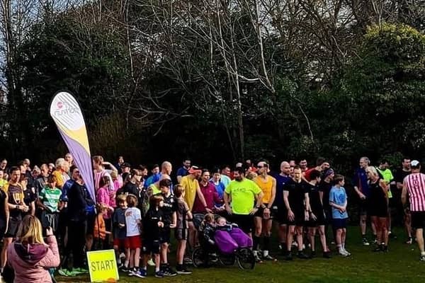 More than 200 runners and walkers gather at the starting line last month for the first parkrun at Queen Elizabeth's Grammar School in Horncastle.
