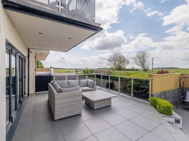 A section of outdoor area to the front of the home.