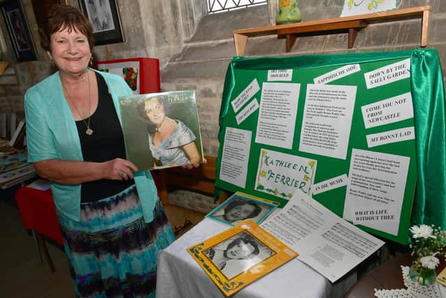 Great Hale church warden and singer Elaine Huckle with her inspirational display.