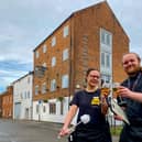 Ashley Thurston and Kerian Wood from The Joseph Morton pub toast the pub's success in this year's Loo of The Year Awards. Photo: Chris Frear
