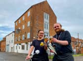 Ashley Thurston and Kerian Wood from The Joseph Morton pub toast the pub's success in this year's Loo of The Year Awards. Photo: Chris Frear