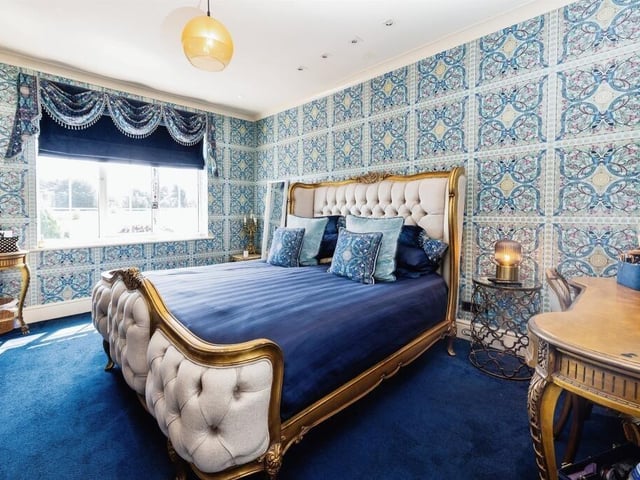 One of the four bedrooms.