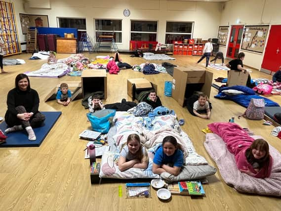 Coningsby St Michael's pupils's Big Sleepout, with teacher Ebony Parker (left).