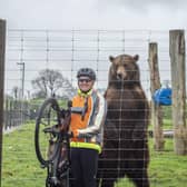 Simon Eyley at Wold Wildlife Park with Maxi the European brown bear. Photo: Holly Parkinson Photography
