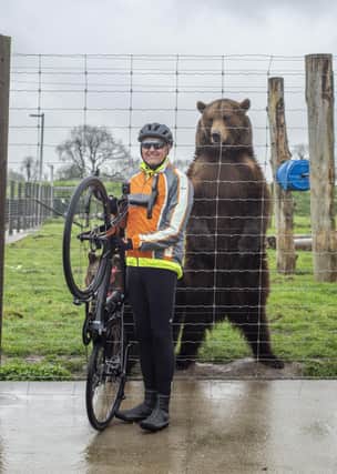 Simon Eyley at Wold Wildlife Park with Maxi the European brown bear. Photo: Holly Parkinson Photography