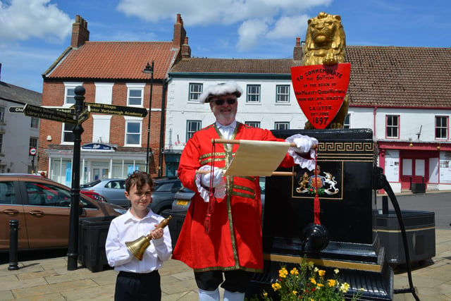 Town Crier William Smith and bell-ringer Jude made the proclamation in the market place