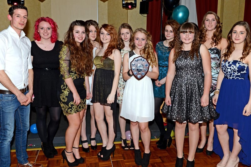 Here we have a photograph from Banovallum School’s annual Sports Personality of the Year awards of 2013. The event was held at the English Golf Union’s headquarters in Woodhall Spa and featured Matthew Bowser, one of the county’s top middle and long distance runners, as guest speaker. He is pictured with the Year 10 rounders squad, winners of the girls team award.