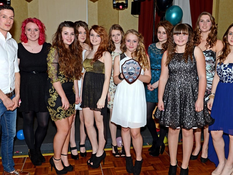 Here we have a photograph from Banovallum School’s annual Sports Personality of the Year awards of 2013. The event was held at the English Golf Union’s headquarters in Woodhall Spa and featured Matthew Bowser, one of the county’s top middle and long distance runners, as guest speaker. He is pictured with the Year 10 rounders squad, winners of the girls team award.