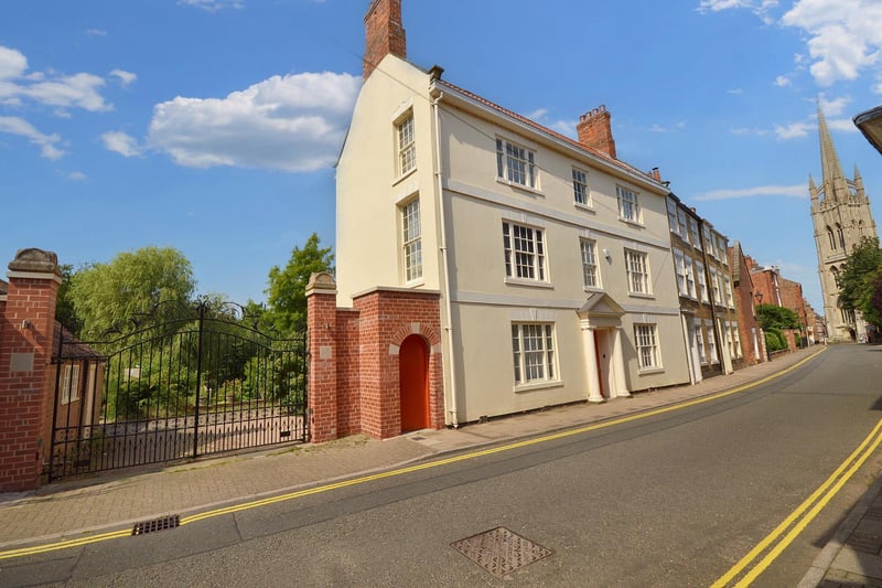 The property in Westgate, Louth, with nearby St James' Church.
