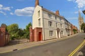 The property in Westgate, Louth, with nearby St James' Church.