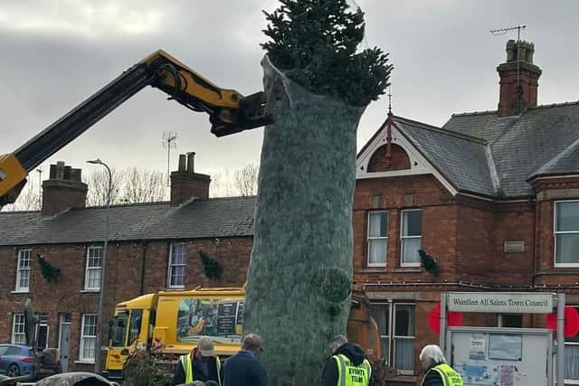 The Christmas tree being placed in Wainfleet market place ahead of the Chrstmas market and switch-on on Saturday.