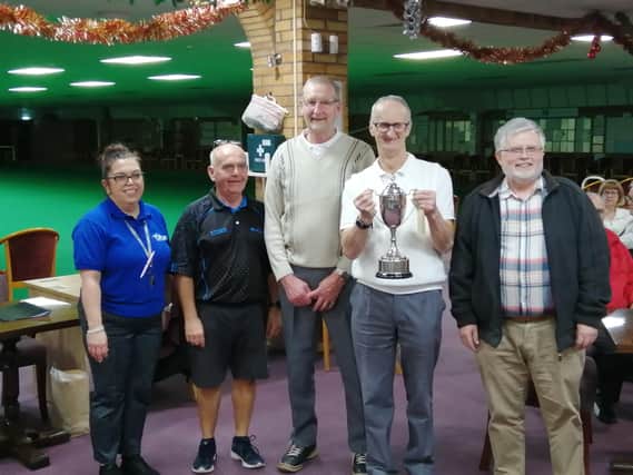 Tanya Whitmore Brown and Mark Brownand, who ran the Christmas Tournament, with the winners, Derrick Pitts, Richard Allam and Steve Wilkinson