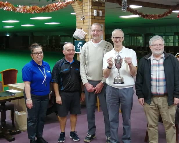 Tanya Whitmore Brown and Mark Brownand, who ran the Christmas Tournament, with the winners, Derrick Pitts, Richard Allam and Steve Wilkinson