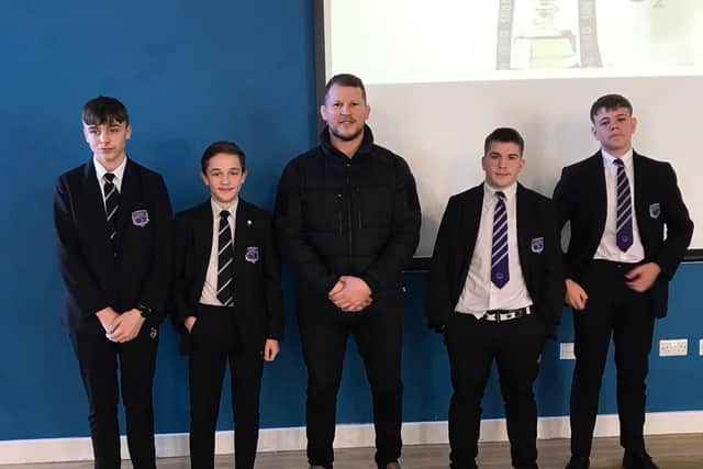 Former England Rugby Captain Dylan Hartley with students
