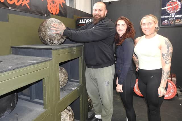 Strongman and gym owner Ben Stacey prepares to host his first Lincolnshire's Strongest event, with his wife Yolanda Stacey (centre) and head coach Scarlett Portues. Phoito: Andy Hubbert