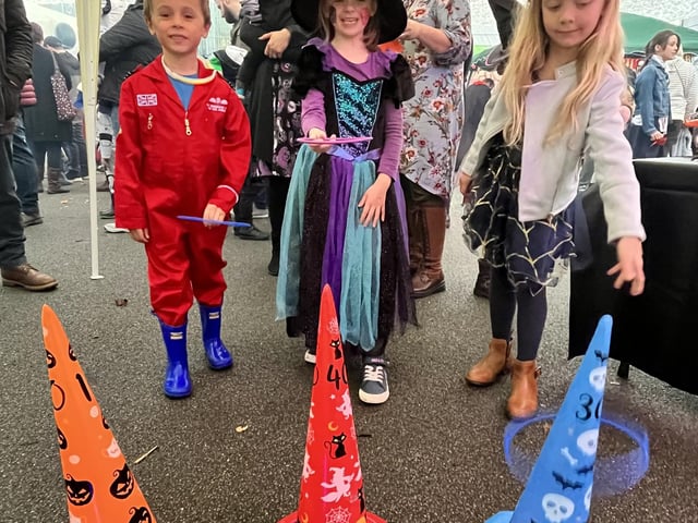 Having a go at the Halloween hoopla, from left: Jack Turner, 5, Rosie Harbridge, 5 and Harriet Higginson, 6.
