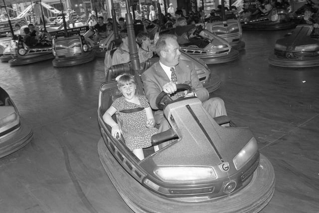 Council leader Paul Goodale in the driving seat as he takes his niece, Natalie, for a spin.