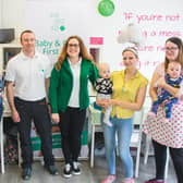 James and Zoe Reddin, centre, teach First Aid to children and parents