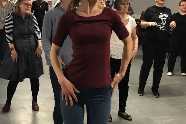 Residents take part in a Salsa class