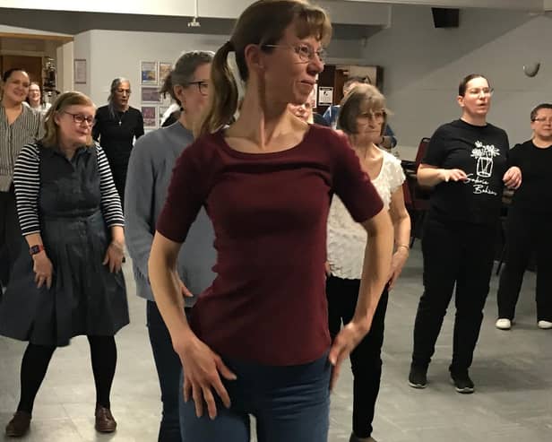 Residents take part in a Salsa class