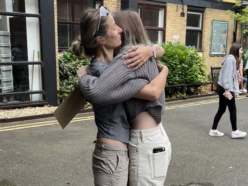 Severija Magnus being congratulated by her mother at Kesteven and Sleaford High School.