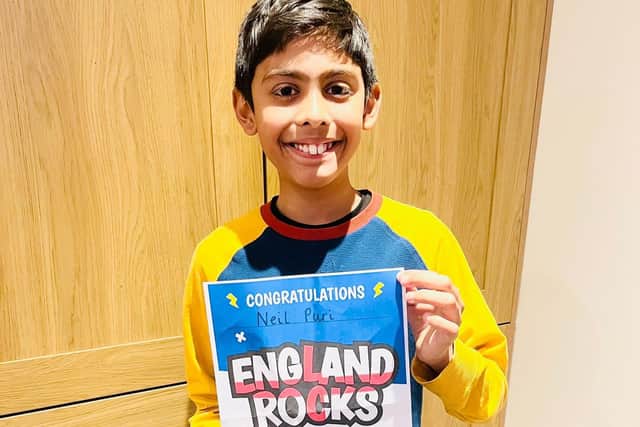 Neil Puri with his Times Table Rockstar competition certificate.
