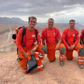 Taking a moment from the search and rescue work in the Atlas Mountains of Morocco. (L-R) Ben Clarke, Darren Burchnall, Karl Keuneke and Neil Woodmansey with Colin the rescue dog.