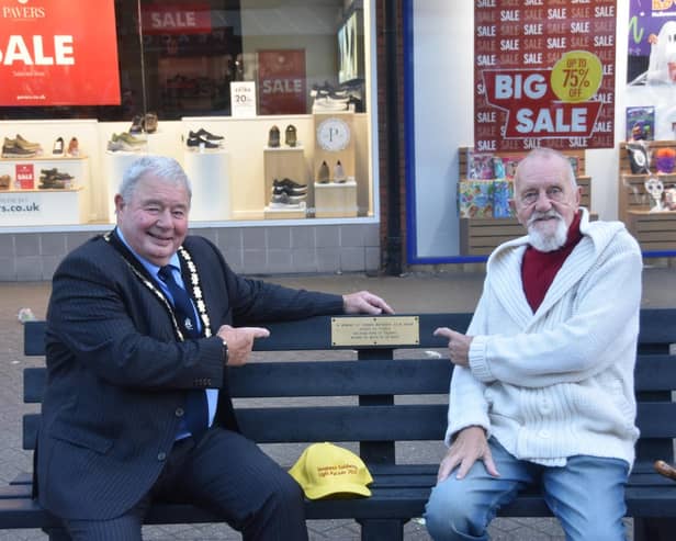 Mayor of Skegness Coun Pete Barry (left) with former councillor George Saxon, on the bench. Photo: Barry Robinson.