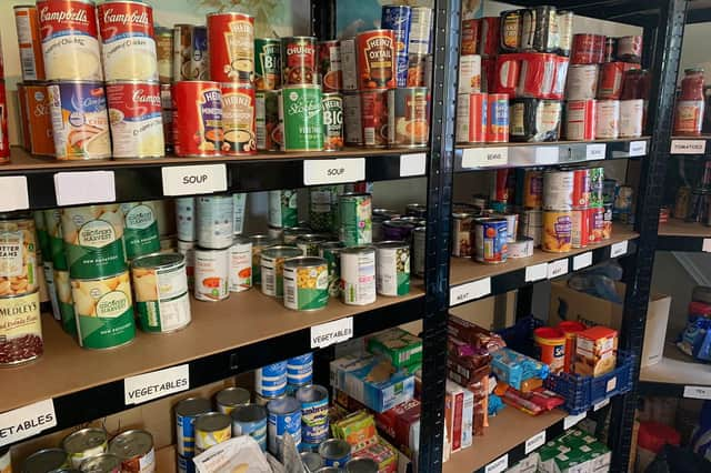 Shelves stocked with emergency food supplied at Boston Food Bank.