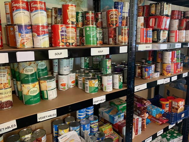 Shelves stocked with emergency food supplied at Boston Food Bank.