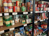 Shelves stocked with emergency food supplied at Boston Food Bank.