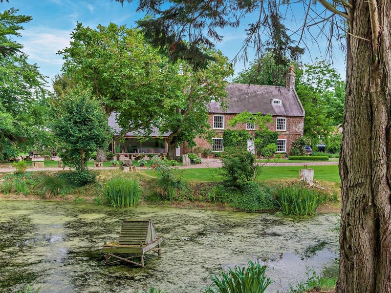 Looking across at the home over the pond.