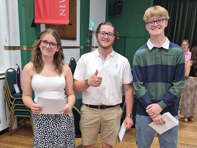 Isabel, Oscar, Alfie collect their results.