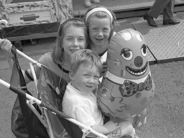 Mr Blobby and a trio at the 1997 May Fair